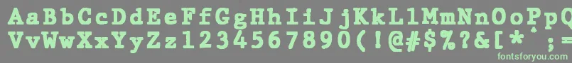 フォントJMH Typewriter mono Black – 灰色の背景に緑のフォント