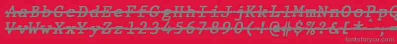 フォントJMH Typewriter mono Bold Italic Over – 赤い背景に灰色の文字