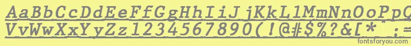 フォントJMH Typewriter mono Bold Italic Under – 黄色の背景に灰色の文字