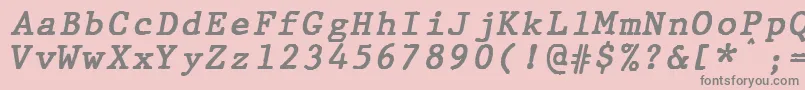 フォントJMH Typewriter mono Bold Italic – ピンクの背景に灰色の文字