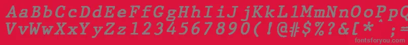 フォントJMH Typewriter mono Bold Italic – 赤い背景に灰色の文字