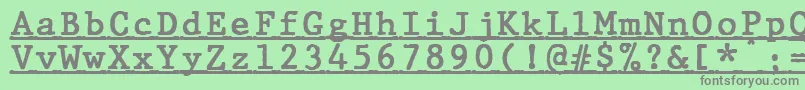 JMH Typewriter mono Bold Under-fontti – harmaat kirjasimet vihreällä taustalla