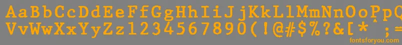 フォントJMH Typewriter mono Bold – オレンジの文字は灰色の背景にあります。