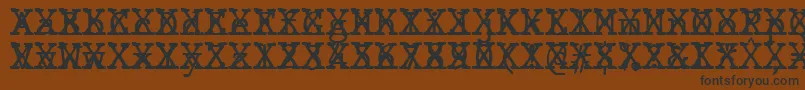 フォントJMH Typewriter mono Cross – 黒い文字が茶色の背景にあります