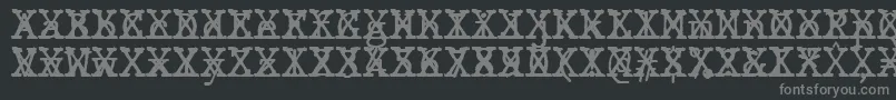 JMH Typewriter mono Cross-fontti – harmaat kirjasimet mustalla taustalla