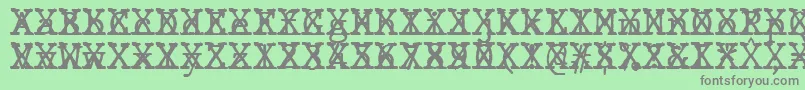 JMH Typewriter mono Cross Font – Gray Fonts on Green Background