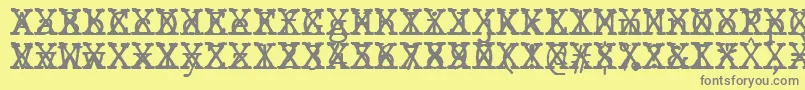 JMH Typewriter mono Cross Font – Gray Fonts on Yellow Background
