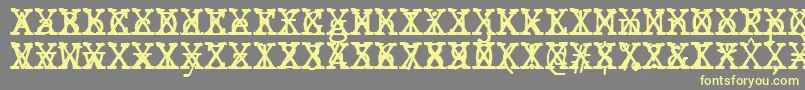 JMH Typewriter mono Cross Font – Yellow Fonts on Gray Background