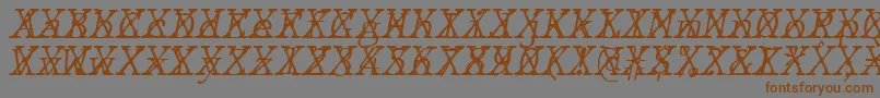Шрифт JMH Typewriter mono Fine Italic Cross – коричневые шрифты на сером фоне