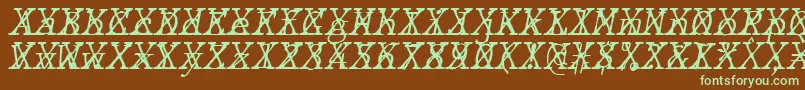 Fonte JMH Typewriter mono Fine Italic Cross – fontes verdes em um fundo marrom