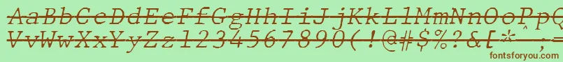 JMH Typewriter mono Fine Italic Over-Schriftart – Braune Schriften auf grünem Hintergrund
