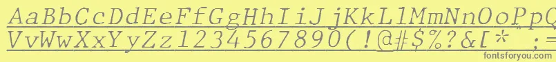 フォントJMH Typewriter mono Fine Italic Under – 黄色の背景に灰色の文字