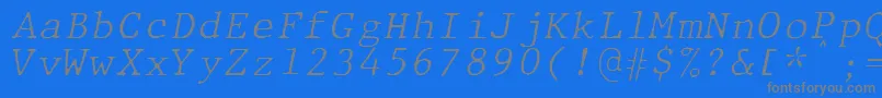 フォントJMH Typewriter mono Fine Italic – 青い背景に灰色の文字