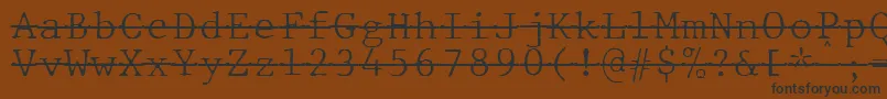 Czcionka JMH Typewriter mono Fine Over – czarne czcionki na brązowym tle