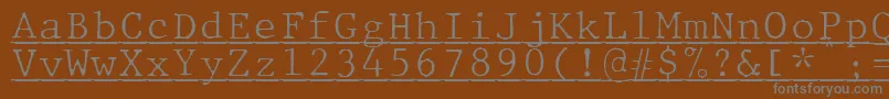 Шрифт JMH Typewriter mono Fine Under – серые шрифты на коричневом фоне