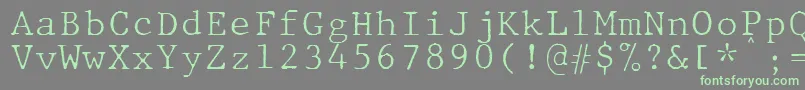 フォントJMH Typewriter mono Fine – 灰色の背景に緑のフォント