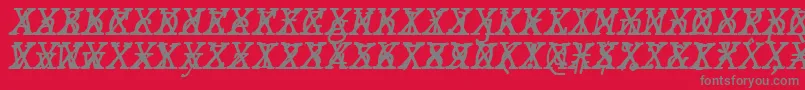 Czcionka JMH Typewriter mono Italic Cross – szare czcionki na czerwonym tle