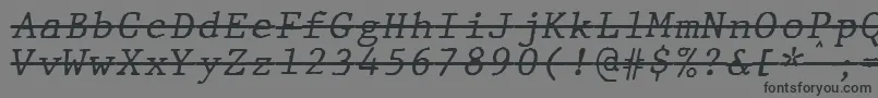 JMH Typewriter mono Italic Over Font – Black Fonts on Gray Background
