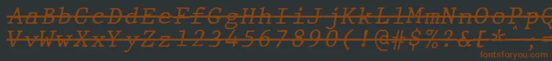 JMH Typewriter mono Italic Over Font – Brown Fonts on Black Background