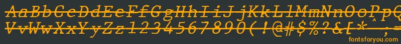 フォントJMH Typewriter mono Italic Over – 黒い背景にオレンジの文字