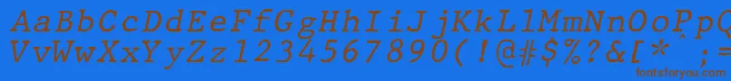 Fonte JMH Typewriter mono Italic – fontes marrons em um fundo azul
