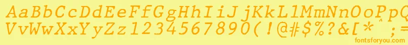Czcionka JMH Typewriter mono Italic – pomarańczowe czcionki na żółtym tle