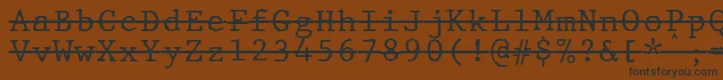 JMH Typewriter mono Over Font – Black Fonts on Brown Background