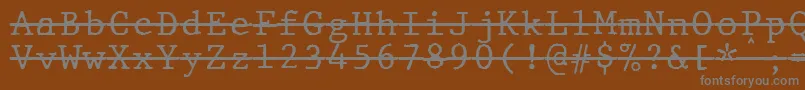 Шрифт JMH Typewriter mono Over – серые шрифты на коричневом фоне
