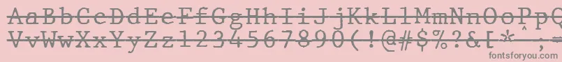 フォントJMH Typewriter mono Over – ピンクの背景に灰色の文字