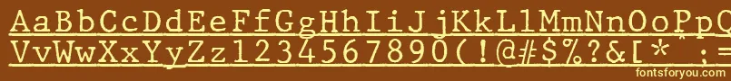 JMH Typewriter mono Under-fontti – keltaiset fontit ruskealla taustalla