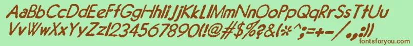 JMH Typewriter Sans Italic-fontti – ruskeat fontit vihreällä taustalla