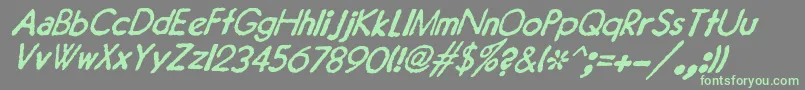 フォントJMH Typewriter Sans Italic – 灰色の背景に緑のフォント