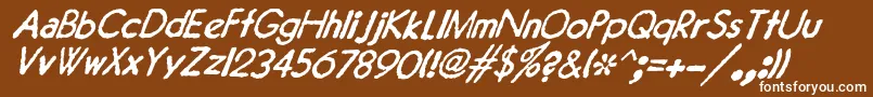 Czcionka JMH Typewriter Sans Italic – białe czcionki na brązowym tle