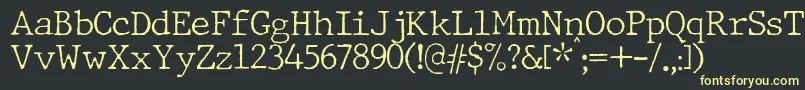Czcionka JMH Typewriter Thin – żółte czcionki na czarnym tle