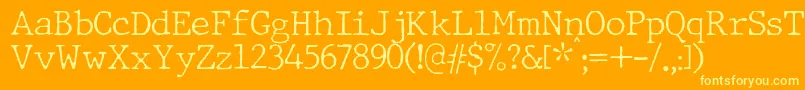 Czcionka JMH Typewriter Thin – żółte czcionki na pomarańczowym tle