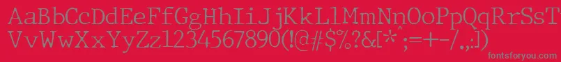 フォントJMH Typewriter Thin – 赤い背景に灰色の文字