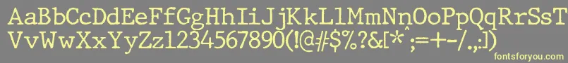 JMH Typewriter Font – Yellow Fonts on Gray Background