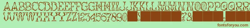 JMH Vortice Font – Brown Fonts on Green Background