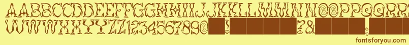 フォントJMH Vortice – 茶色の文字が黄色の背景にあります。