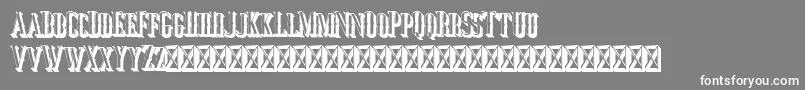 フォントJocker Extrude Right – 灰色の背景に白い文字