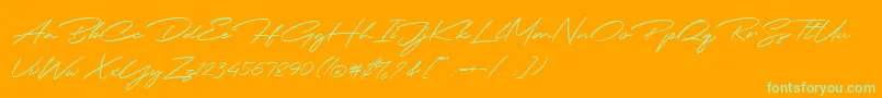 Fonte Jodie Badiston Script Demo – fontes verdes em um fundo laranja