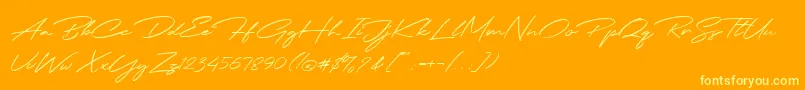 Jodie Badiston Script Demo Font – Yellow Fonts on Orange Background