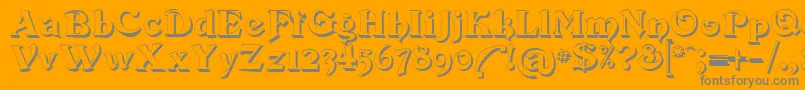 Devinneswashshadow-Schriftart – Graue Schriften auf orangefarbenem Hintergrund