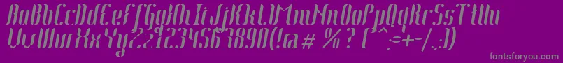 Johanna Italic-fontti – harmaat kirjasimet violetilla taustalla