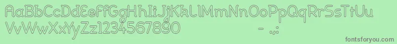 フォントJohanna light – 緑の背景に灰色の文字