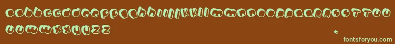 フォントJohanneke Pro mixed – 緑色の文字が茶色の背景にあります。