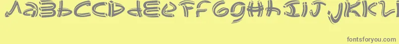 Fonte johao s  font – fontes cinzas em um fundo amarelo