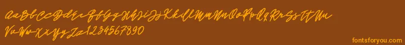 John Bold Font – Orange Fonts on Brown Background