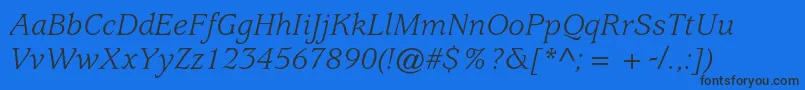 フォントUsherwoodstdBookitalic – 黒い文字の青い背景