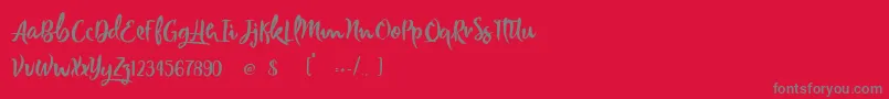 Joker Smiling Font – Gray Fonts on Red Background